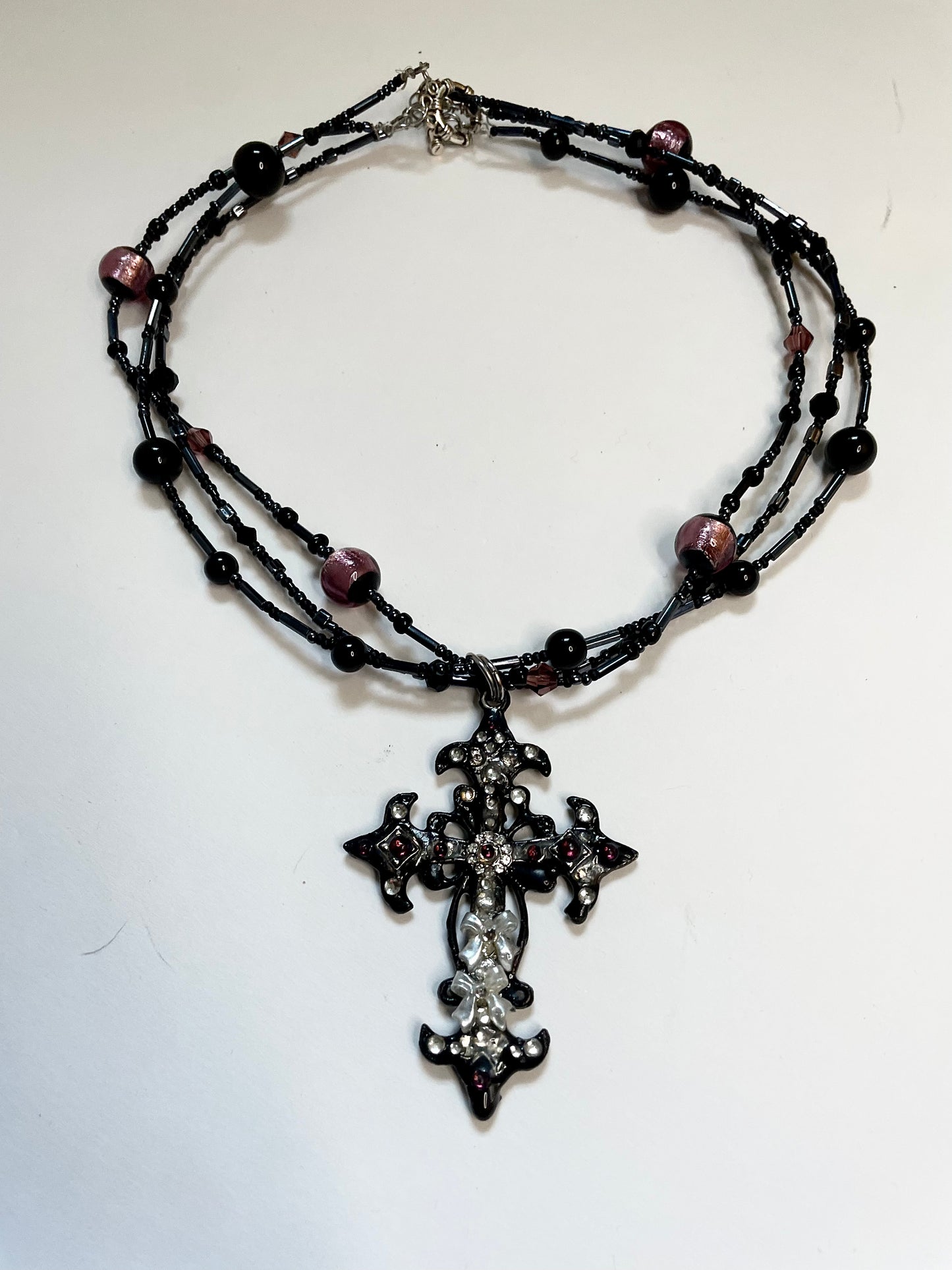 dense triple layer rhinestone cross choker