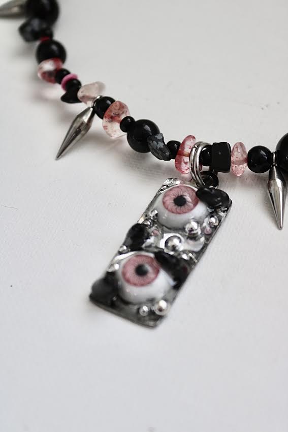 double-eyed monster spiked choker