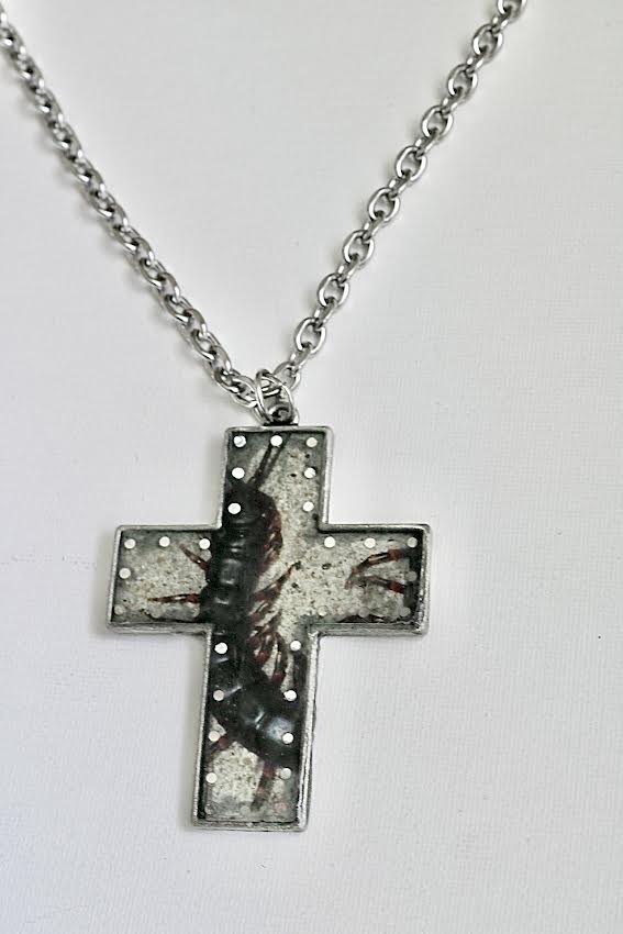 centipede holy cross necklace