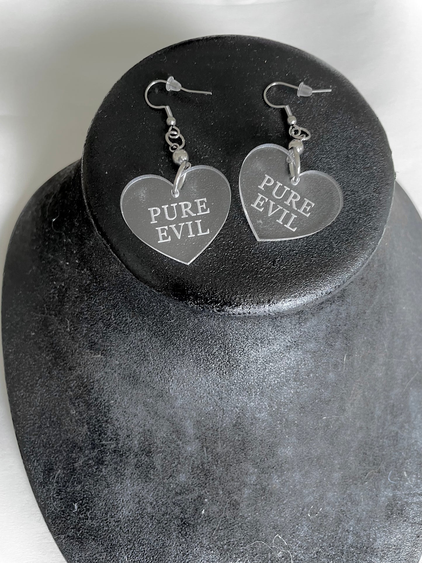 pure evil acrylic heart earrings